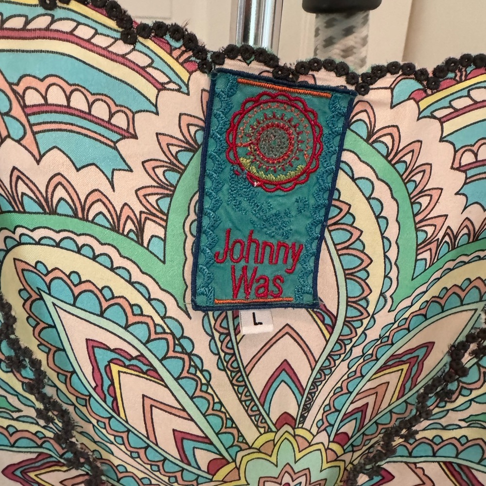 Gorgeous silk top by Johnny Was. Excellent news condition, size large.